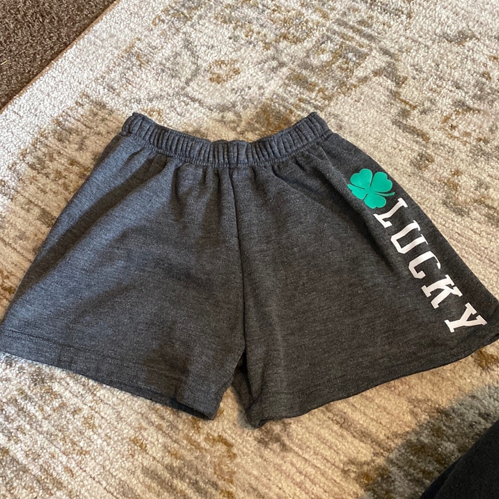Sweat shorts that say “Lucky”
